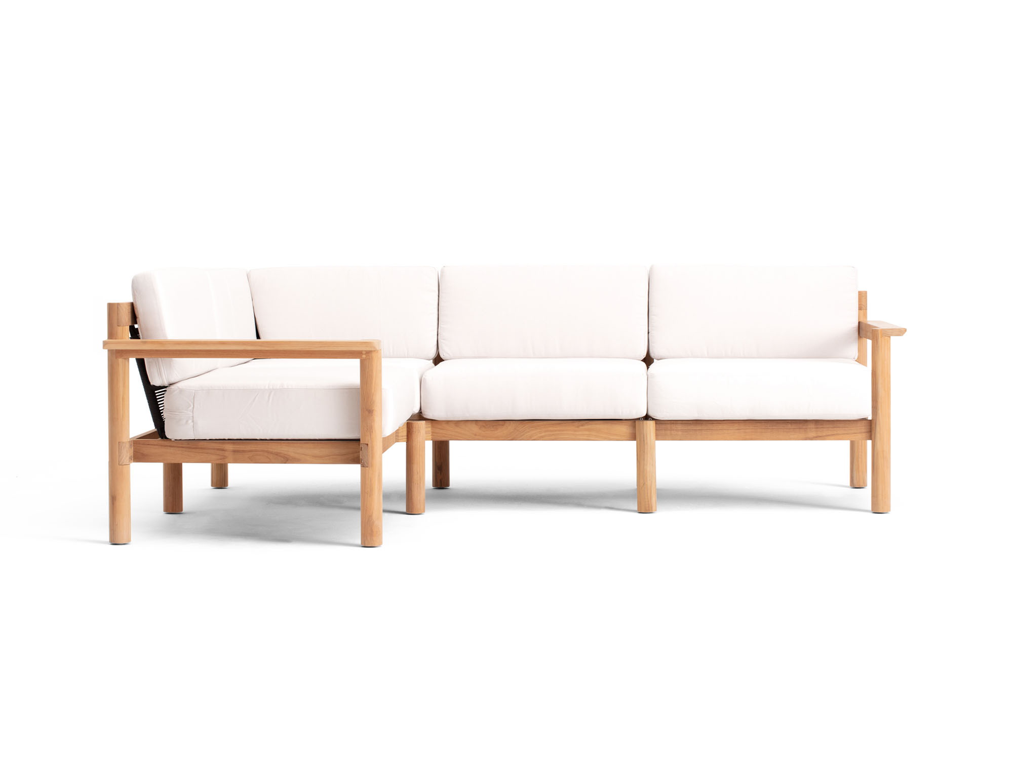 Front view of 4-piece outdoor sectional with white cushions